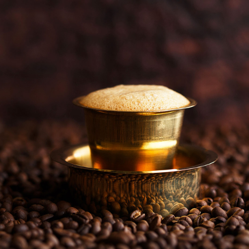 Best filter chai in Indore served in traditional brass tumbler at a Vijay Nagar cafe